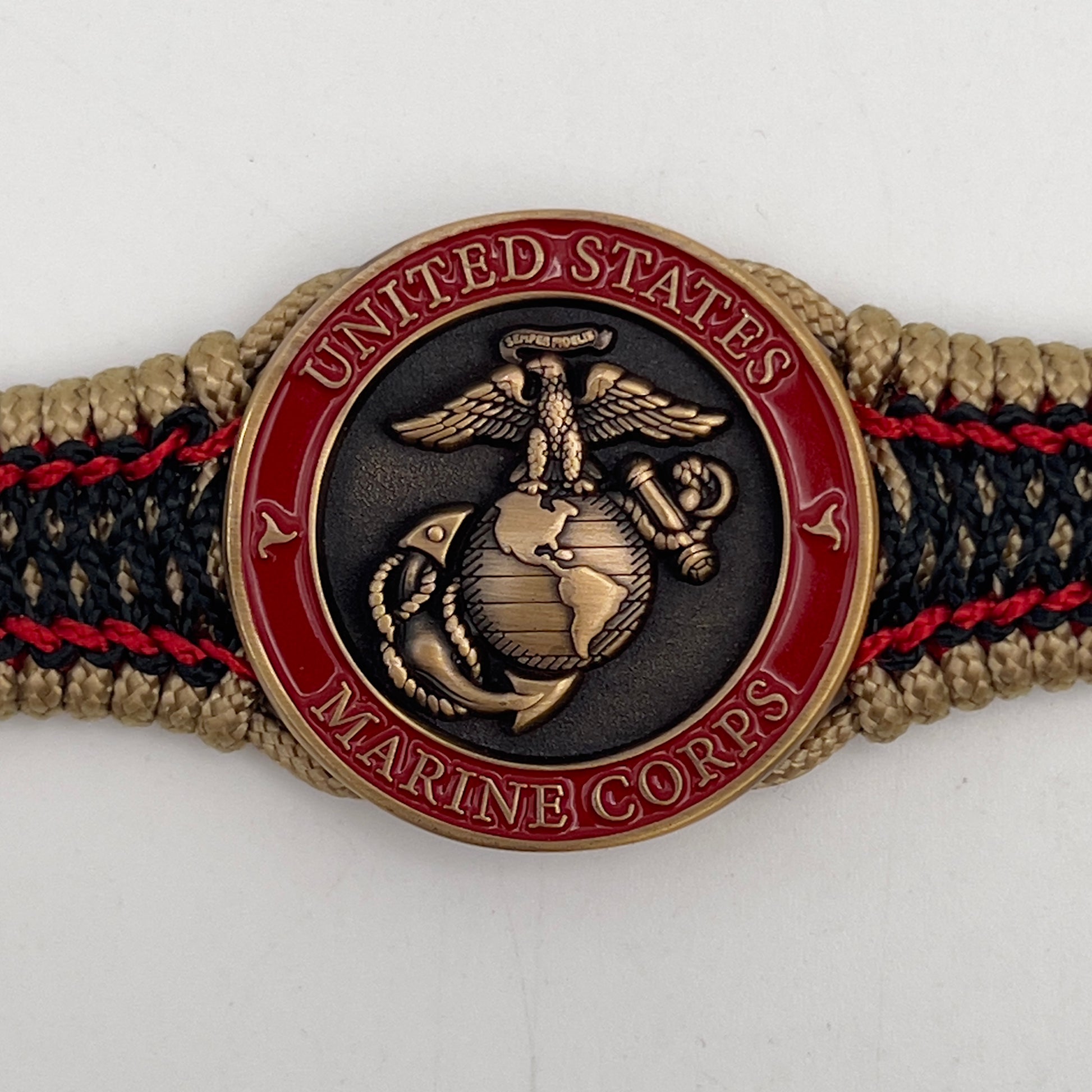 Thin, narrow, very thin and flexible and comfortable braided United States Marine Corps bracelet featuring a 24K antique gold plated USMC Eagle Globe and Anchor medallion, a gold Cobra style tactical buckle and woven with gold Type-1 paracord and Imperial Red and Black nano cord.