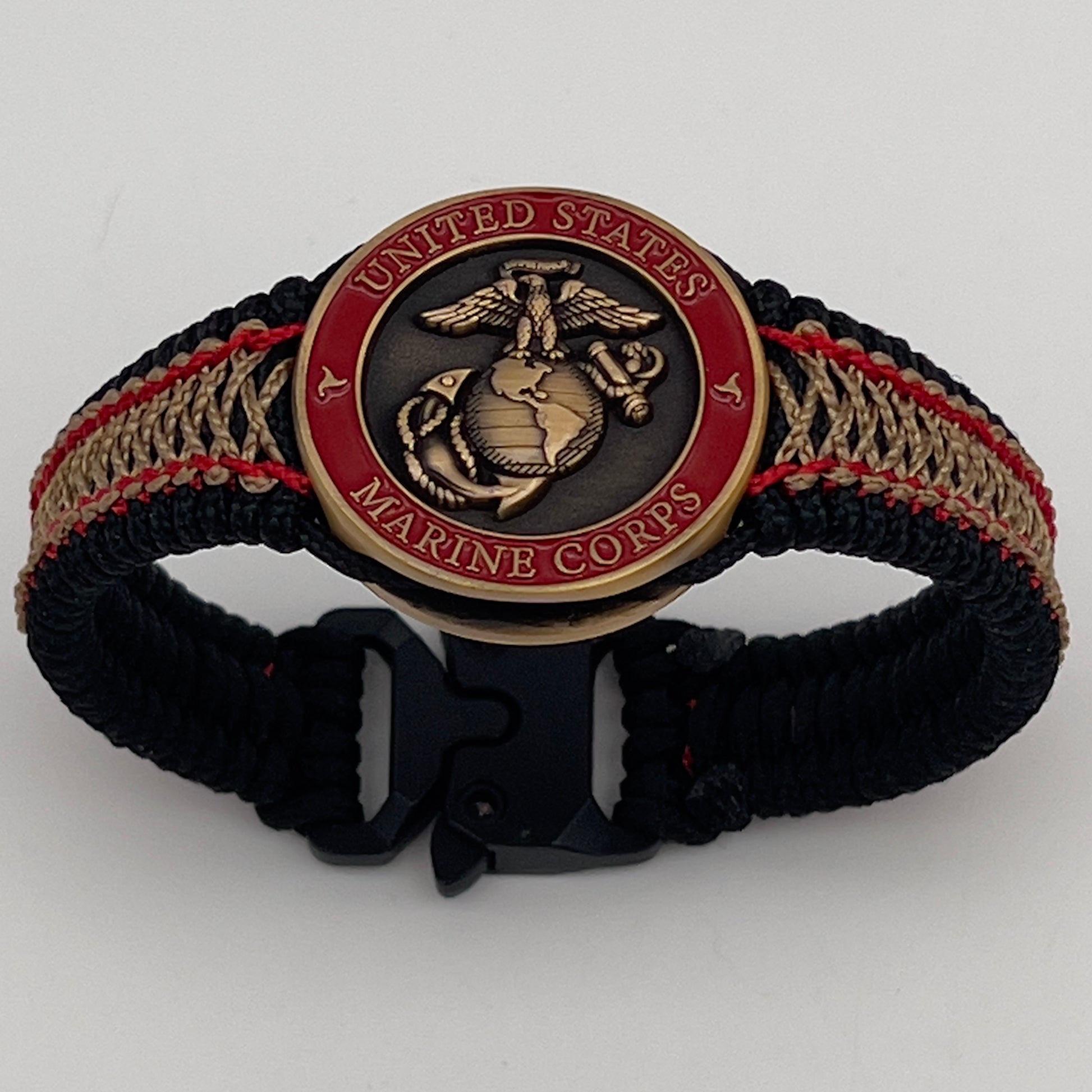 Thin, narrow, very thin and flexible and comfortable braided United States Marine Corps bracelet featuring a 24K antique gold plated USMC Eagle Globe and Anchor medallion, a black Cobra style tactical buckle and woven with black Type-1 paracord and Imperial Red and GOld nano cord.