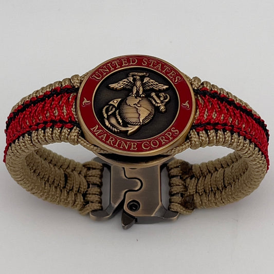 Thin, narrow, very thin and flexible and comfortable braided United States Marine Corps bracelet featuring a 24K antique gold plated USMC Eagle Globe and Anchor medallion, a gold Cobra style tactical buckle and woven with gold Type-1 paracord and Imperial Red and Black nano cord.