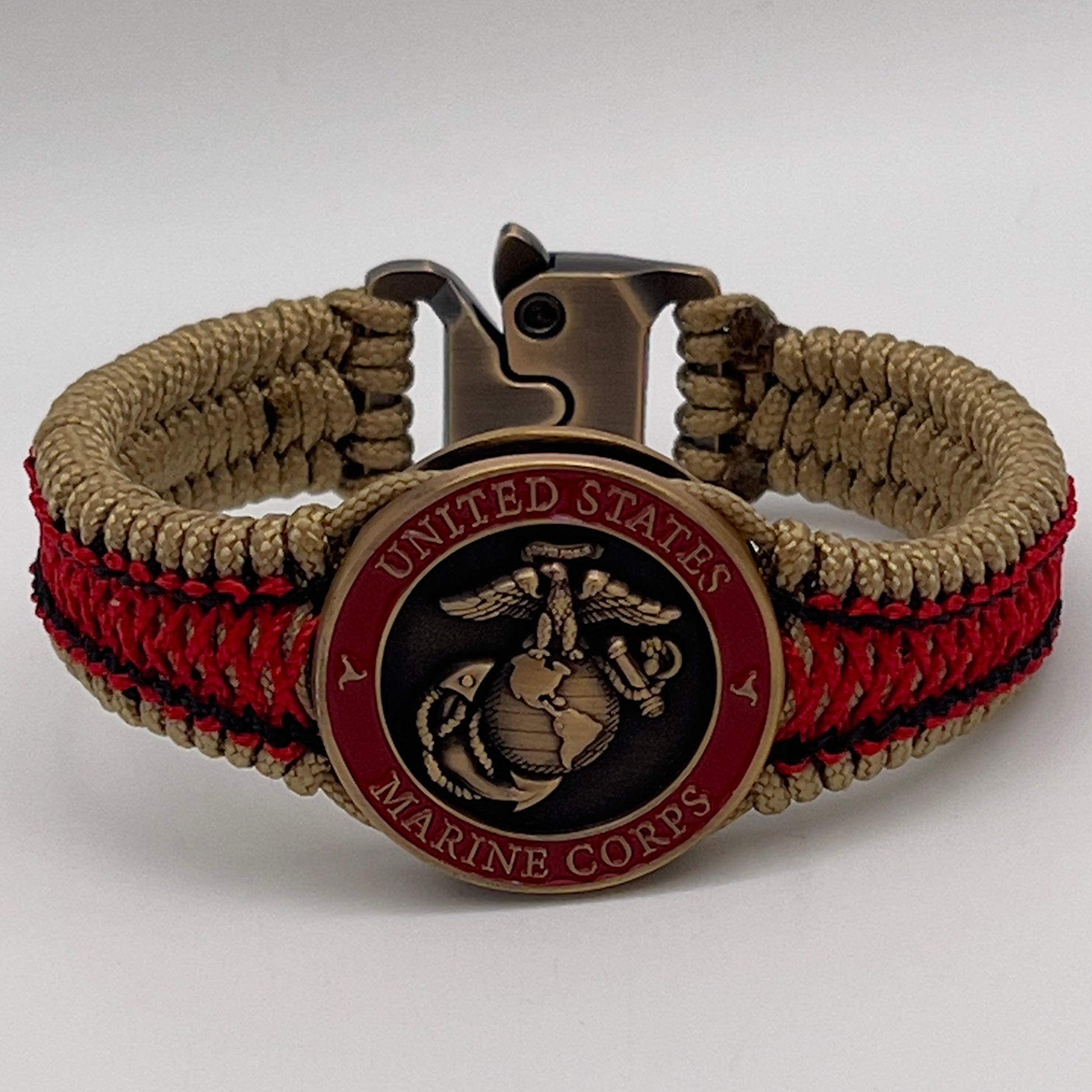 Thin, narrow, very thin and flexible and comfortable braided United States Marine Corps bracelet featuring a 24K antique gold plated USMC Eagle Globe and Anchor medallion, a gold Cobra style tactical buckle and woven with gold Type-1 paracord and Imperial Red and Black nano cord.