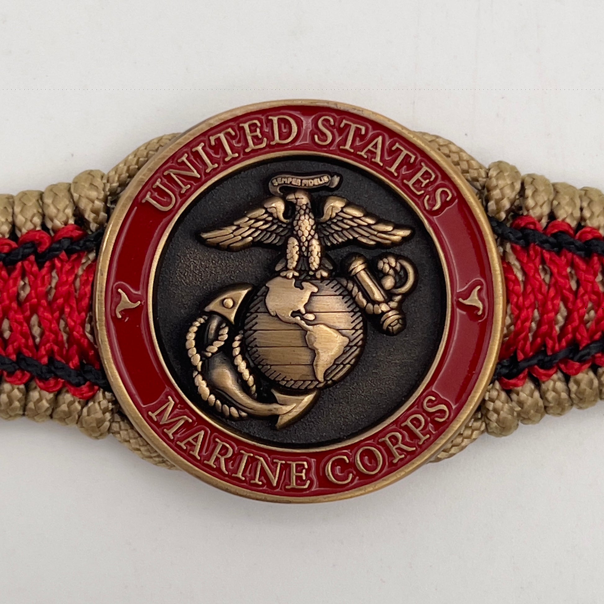 Thin, narrow, very thin and flexible and comfortable braided United States Marine Corps bracelet featuring a 24K antique gold plated USMC Eagle Globe and Anchor medallion, a gold Cobra style tactical buckle and woven with gold Type-1 paracord and Imperial Red and Black nano cord.