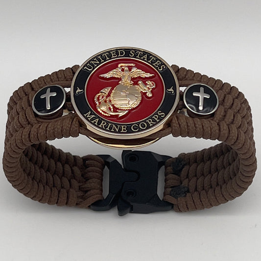 Thin, medium width, flexible and comfortable braided United States Marine Corps bracelet featuring a 24K gold plated USMC officer Eagle Globe and Anchor medallion, two Christian crosses, a black Cobra style tactical buckle and woven with Coyote Brown Type-1 paracord.