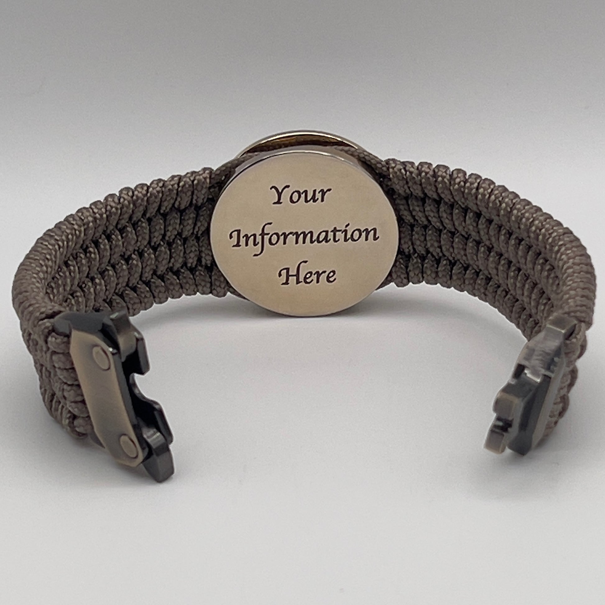 Thin, medium width, flexible and comfortable braided United States Marine Corps bracelet featuring a 24K gold plated USMC officer Eagle Globe and Anchor medallion, a gold Cobra style tactical buckle and woven with Tan Type-1 paracord.