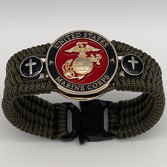 Thin, medium width, flexible and comfortable braided United States Marine Corps bracelet featuring a 24K gold plated USMC officer Eagle Globe and Anchor medallion, two Christian crosses, a black Cobra style tactical buckle and woven with Olive Drab Type-1 paracord.