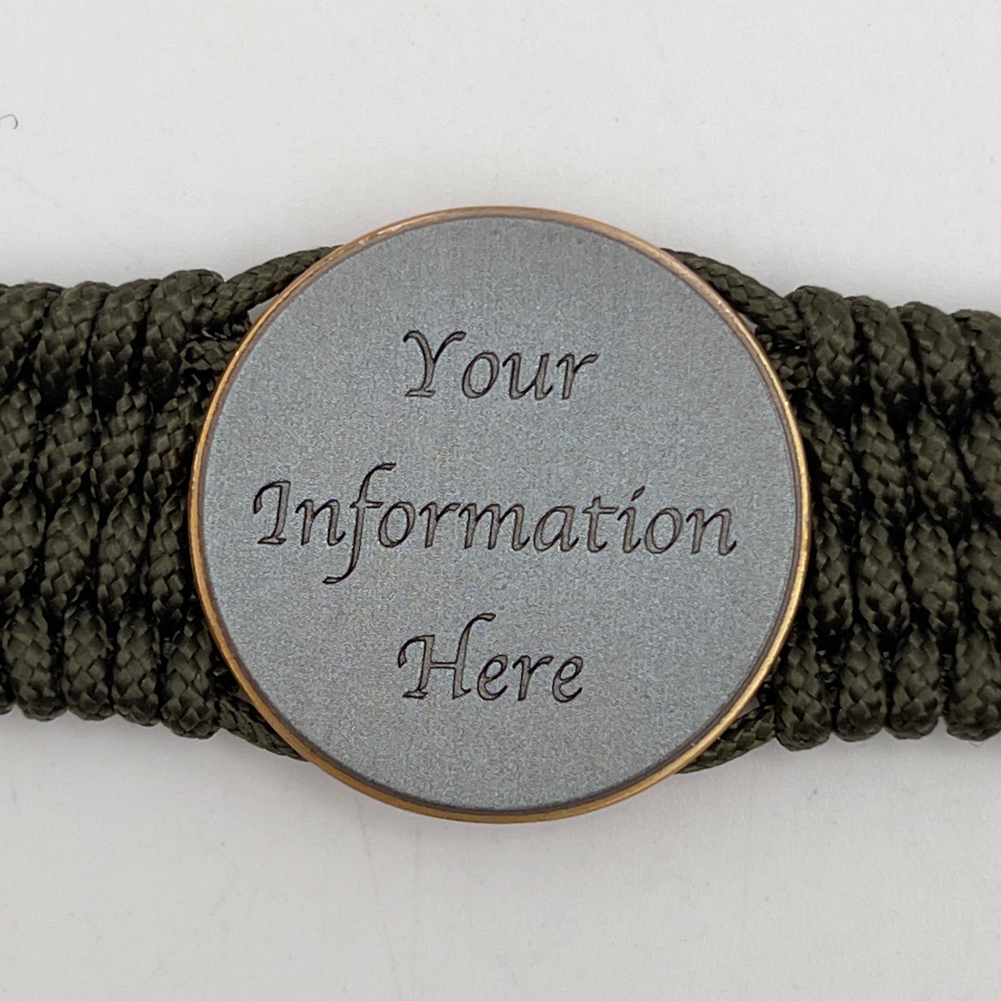 Thin, medium wide, flexible and comfortable braided United States Marine Corps bracelet featuring a 24K antique gold plated USMC Eagle Globe and Anchor medallion, a gold Cobra style tactical buckle and woven with Olive Drab Type-1 paracord.