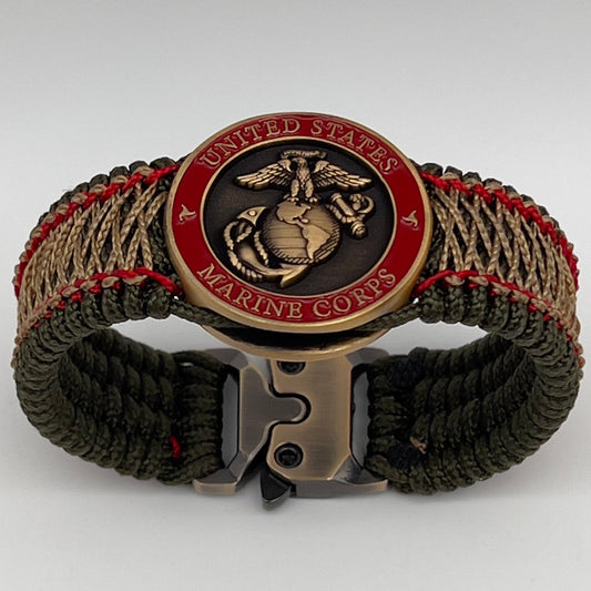 Thin, medium width, flexible and comfortable braided United States Marine Corps bracelet featuring a 24K antique gold plated USMC Eagle Globe and Anchor medallion, a gold Cobra style tactical buckle and woven with Olive Drab Type-1 paracord and Imperial Red and Gold nano cord.