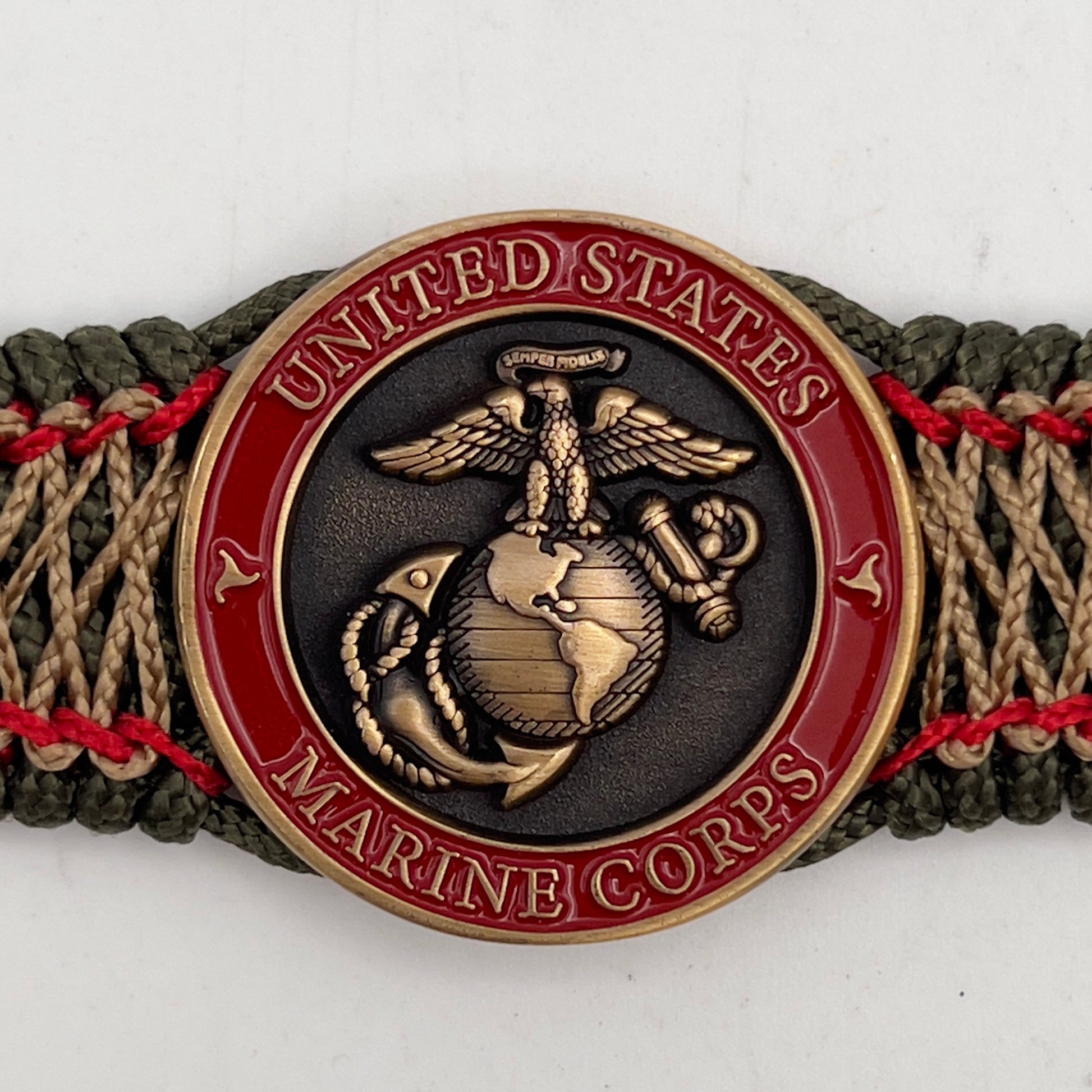 Thin, medium width, flexible and comfortable braided United States Marine Corps bracelet featuring a 24K antique gold plated USMC Eagle Globe and Anchor medallion, a gold Cobra style tactical buckle and woven with Olive Drab Type-1 paracord and Imperial Red and Gold nano cord.