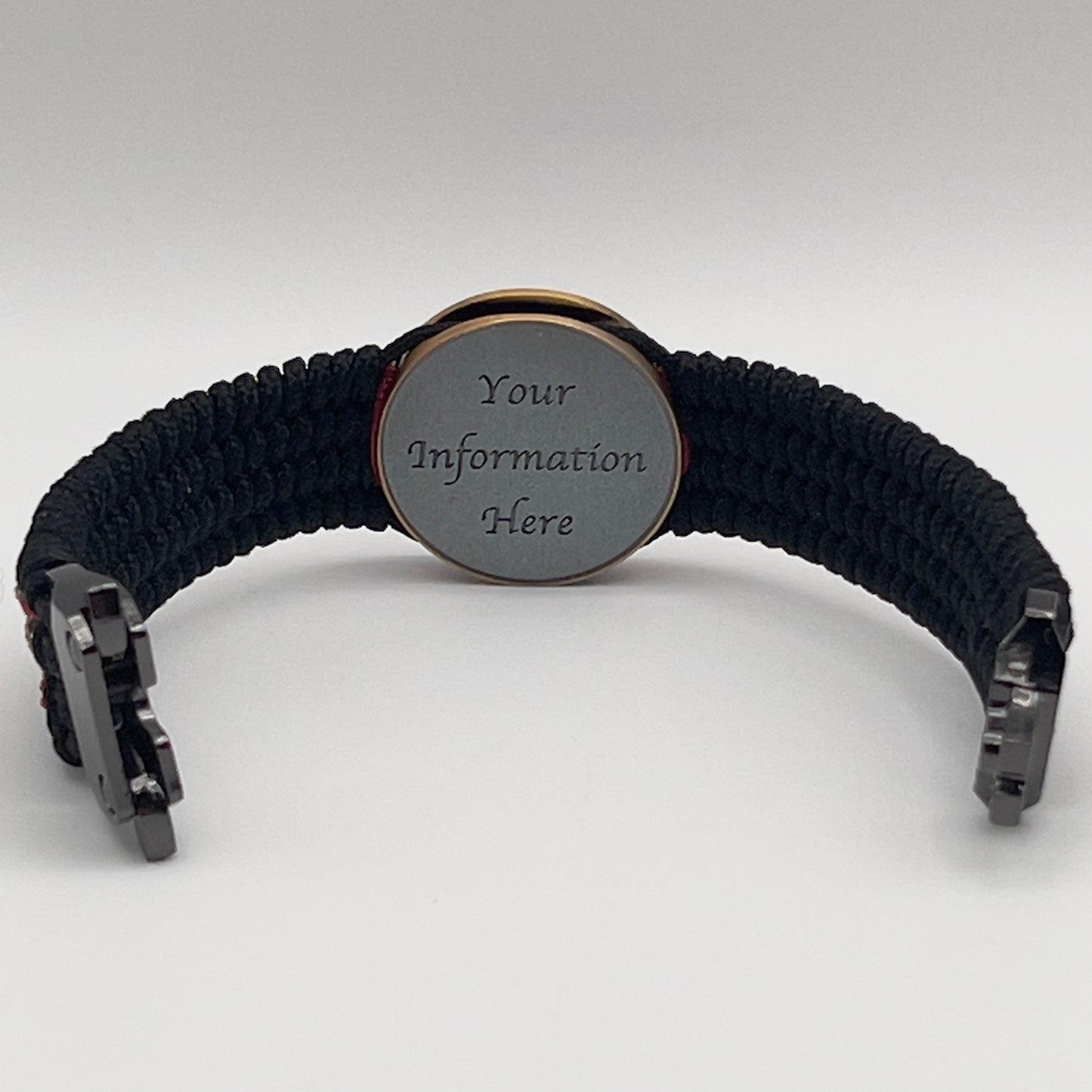 Thin, medium width, flexible and comfortable braided United States Marine Corps bracelet featuring a 24K antique gold plated USMC Eagle Globe and Anchor medallion, a black Cobra style tactical buckle and woven with black Type-1 paracord and Imperial Red and Gold nano cord.