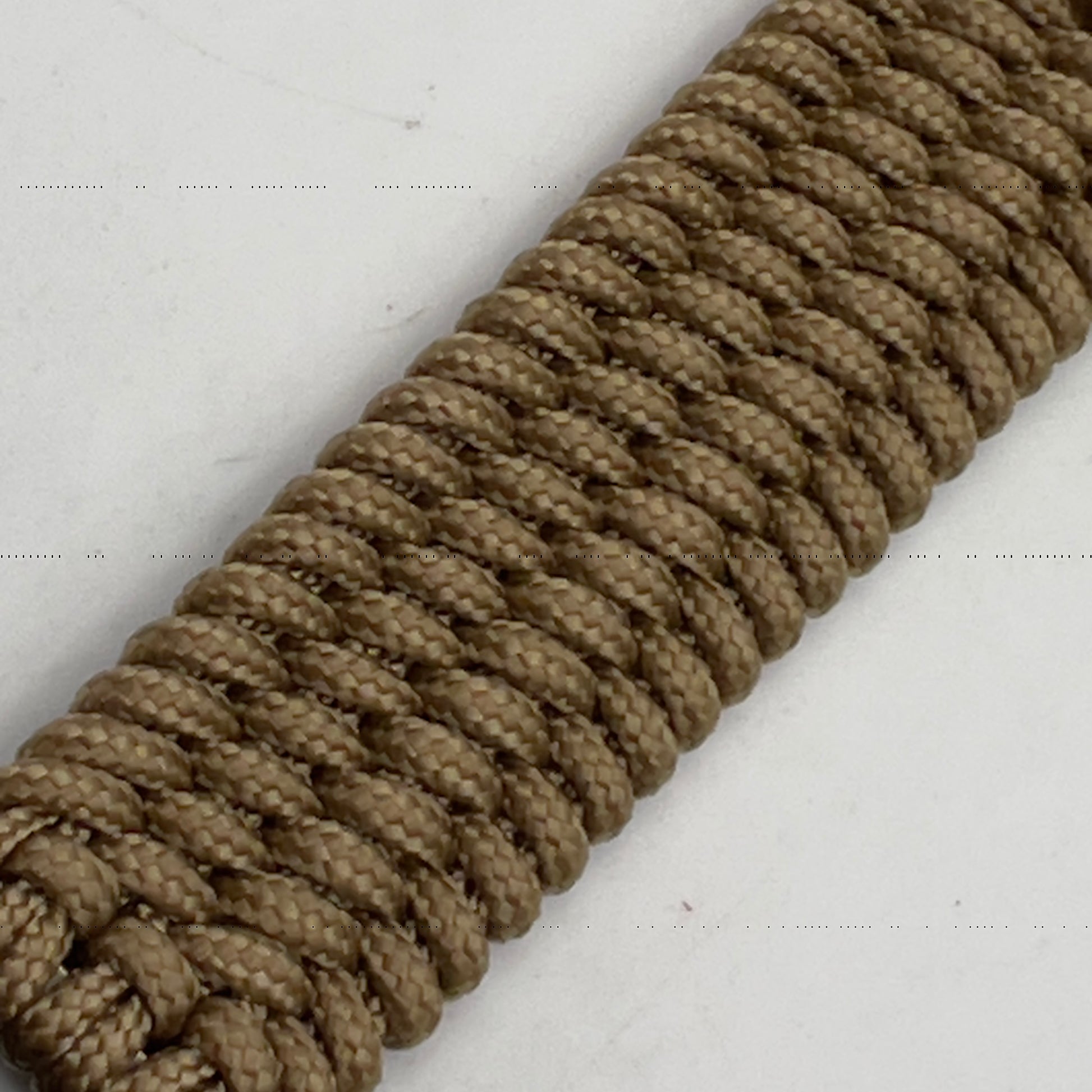 Thin, wide, flexible and comfortable braided United States Marine Corps bracelet featuring a 24K antique gold plated USMC Eagle Globe and Anchor medallion, a gold Cobra style tactical buckle and woven with gold Type-1 paracord.