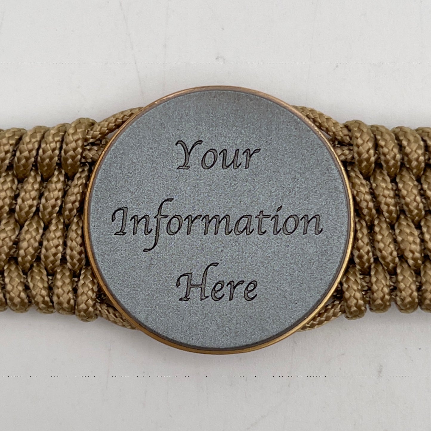 Thin, wide, flexible and comfortable braided United States Marine Corps bracelet featuring a 24K antique gold plated USMC Eagle Globe and Anchor medallion, a gold Cobra style tactical buckle and woven with gold Type-1 paracord.