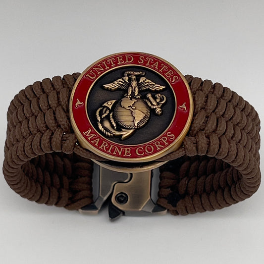 Thin, medium wide, flexible and comfortable braided United States Marine Corps bracelet featuring a 24K antique gold plated USMC Eagle Globe and Anchor medallion, a gold Cobra style tactical buckle and woven with Coyote Brown Type-1 paracord.
