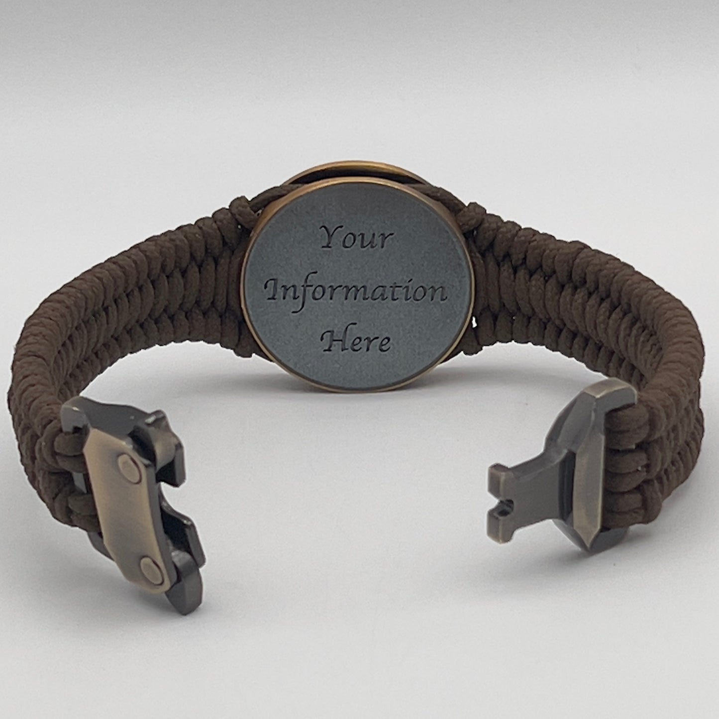 Thin, narrow, flexible and comfortable braided United States Marine Corps bracelet featuring a 24K antique gold plated USMC Eagle Globe and Anchor medallion, a gold Cobra style tactical buckle and woven with Coyote Brown Type-1 paracord.