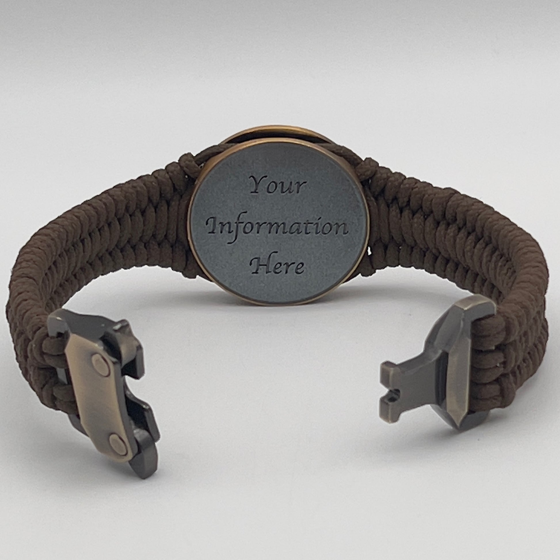 Thin, narrow, flexible and comfortable braided United States Marine Corps bracelet featuring a 24K antique gold plated USMC Eagle Globe and Anchor medallion, a gold Cobra style tactical buckle and woven with Coyote Brown Type-1 paracord.
