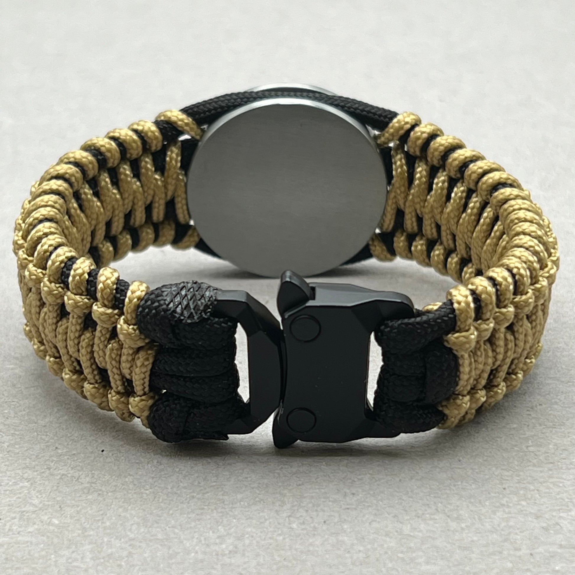 handcrafted paracord bracelet beaded medallion.