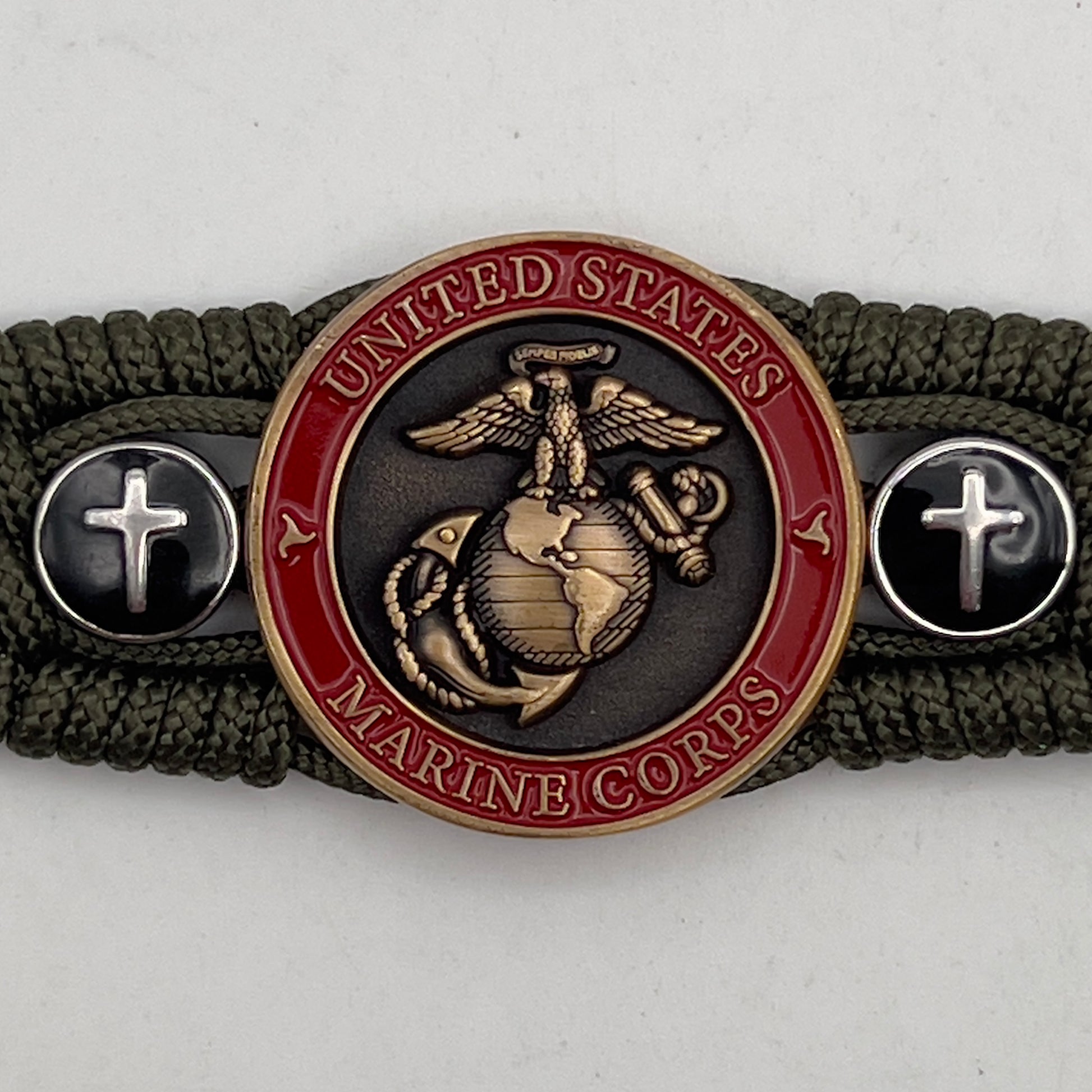 Thin, medium width, flexible and comfortable braided United States Marine Corps bracelet featuring a 24K antique gold plated USMC officer Eagle Globe and Anchor medallion, two Christian crosses, a black Cobra style tactical buckle and woven with Olive Drab Type-1 paracord.