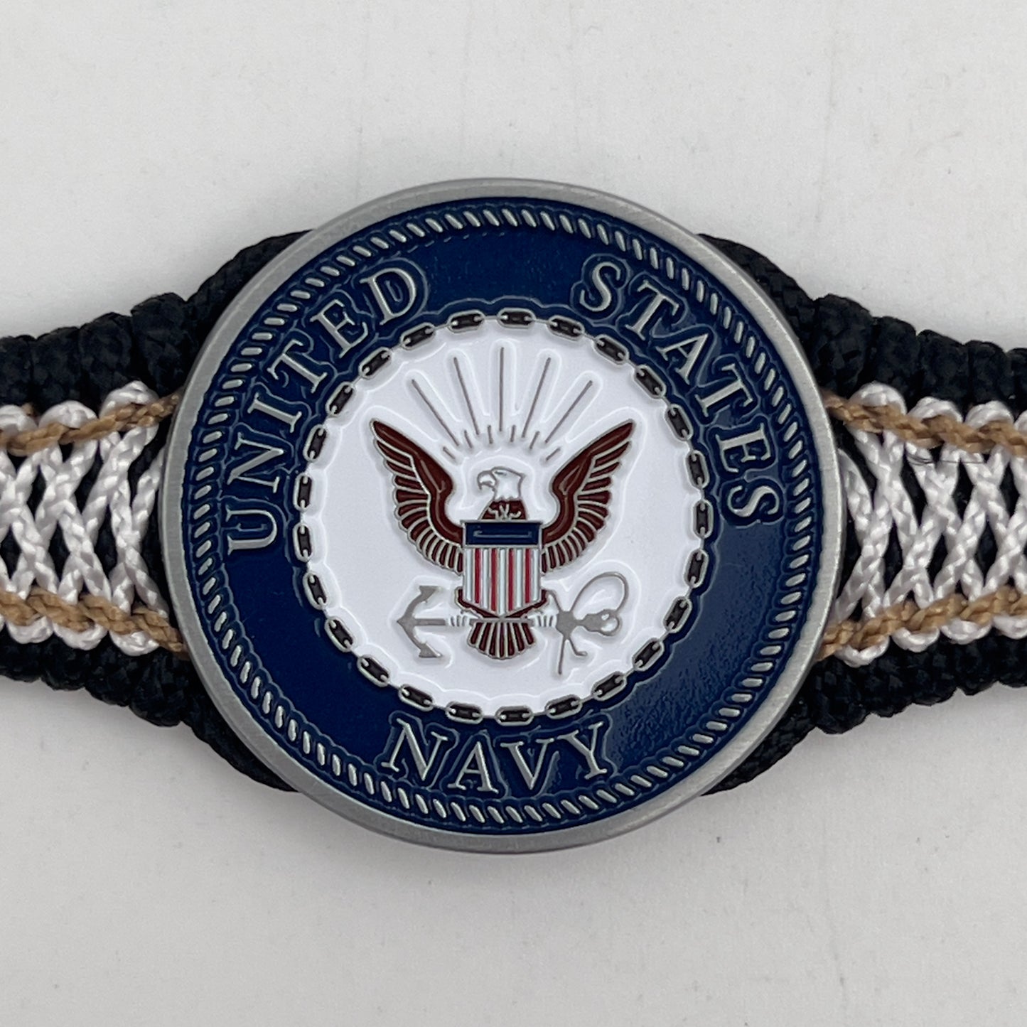 Thin, narrow, flexible and comfortable braided United States Marine Corps bracelet featuring an antique silver plated United States Navy medallion, a black Cobra style tactical buckle and woven with black Type-1 paracord and Gold adn White nano cord.