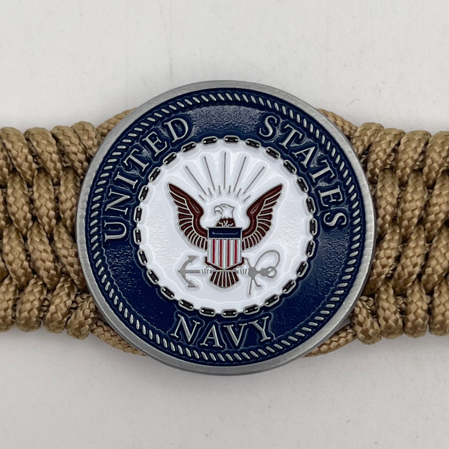 Thin, wide, flexible and comfortable braided United States Navy bracelet featuring an antique silver plated Navy medallion, a gold Cobra style tactical buckle and woven with gold Type-1 paracord.
