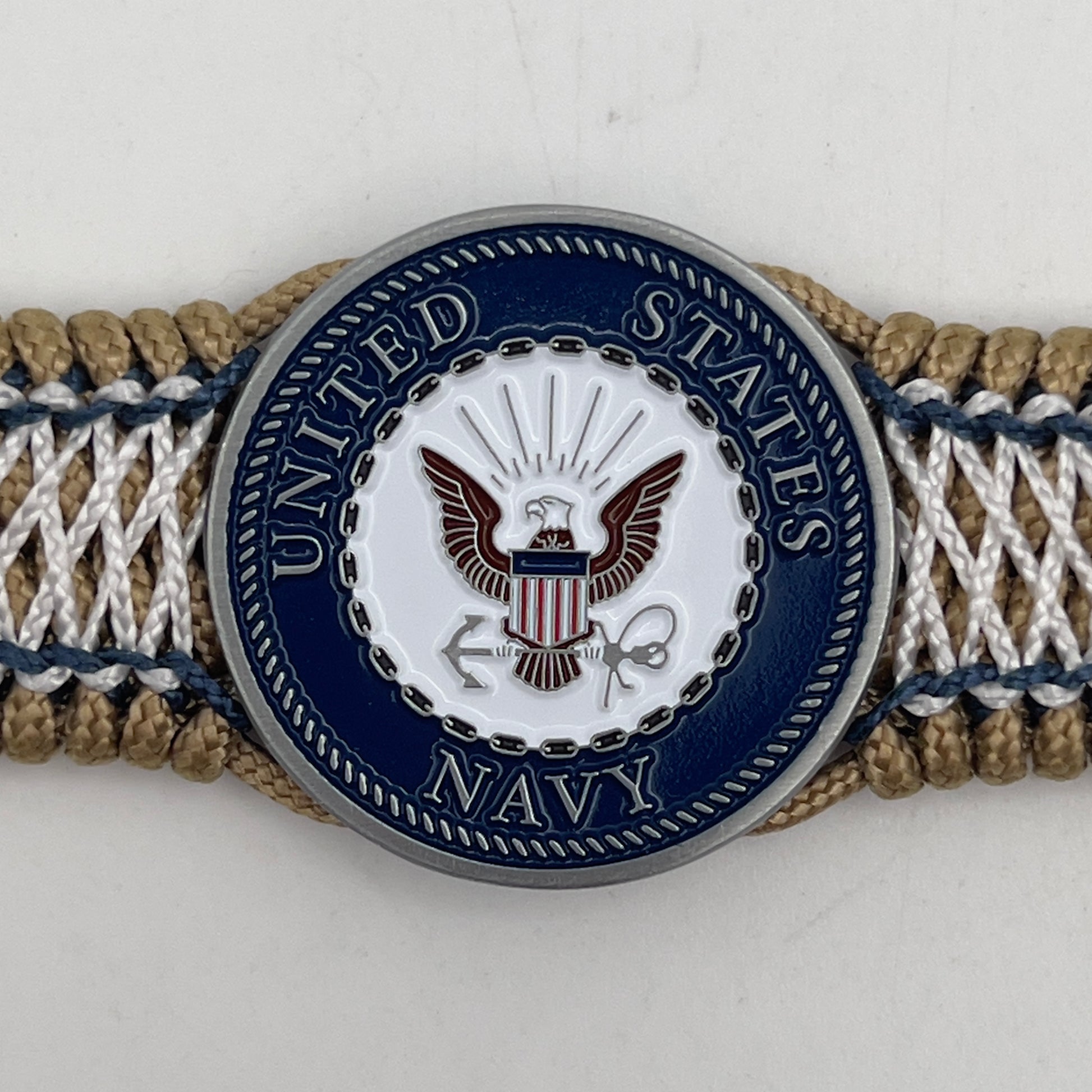 Thin, wide and comfortable braided United States Navy bracelet featuring an antique silver plated Navy medallion, a gold Cobra style tactical buckle and woven with gold Type-1 paracord and Navy Blue and White nano cord.