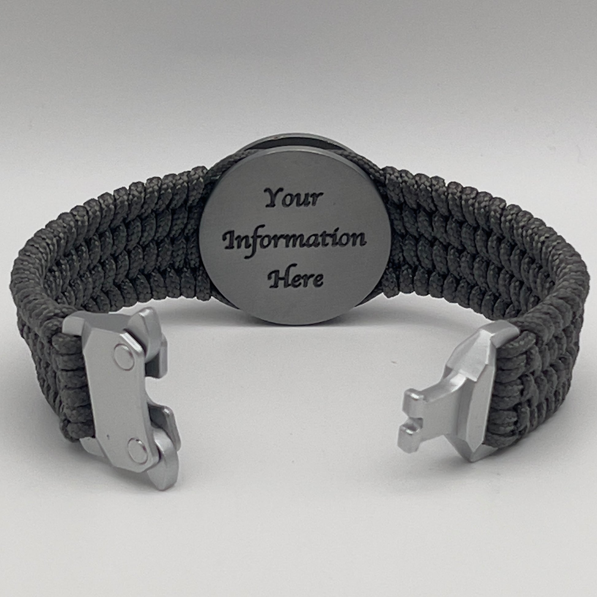 Thin, wide, flexible and comfortable braided United States Marine Corps Iwo Jima bracelet featuring an antique silver plated Iwo Jima flag raising medallion, a silver Cobra style tactical buckle and woven with gray Type-1 paracord.