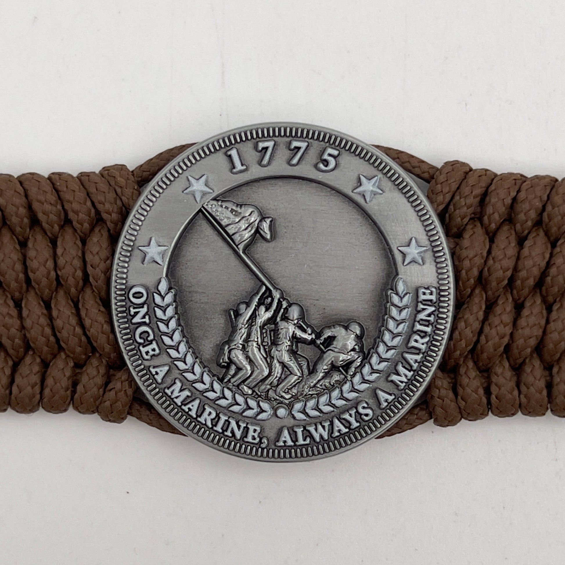 Thin, wide, flexible and comfortable braided United States Marine Corps Iwo Jima bracelet featuring an antique silver plated Iwo Jima flag raising medallion, a silver Cobra style tactical buckle and woven with Coyote Brown Type-1 paracord.