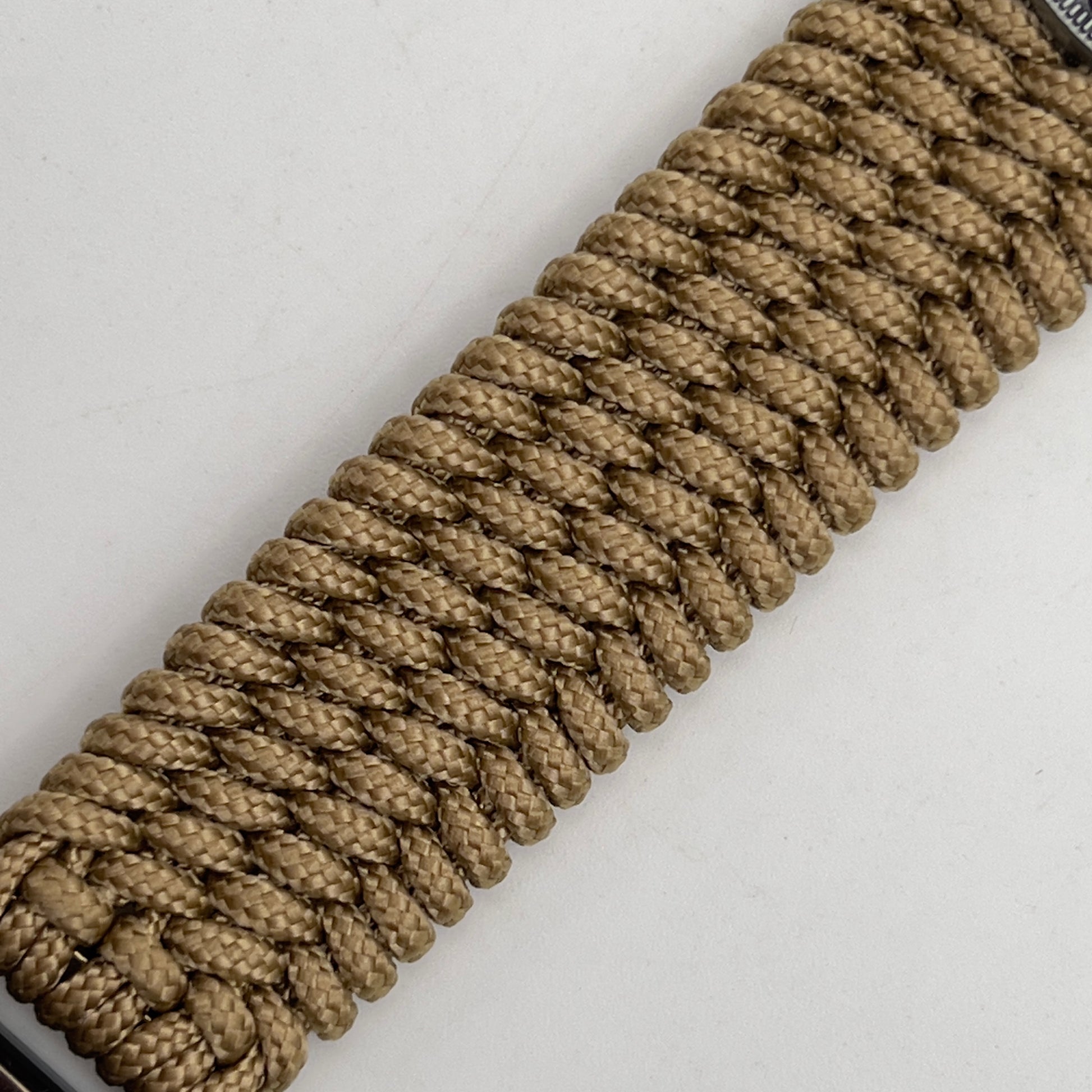 Thin, wide, flexible and comfortable braided United States Marine Corps Iwo Jima bracelet featuring an antique silver plated Iwo Jima flag raising medallion, a gold Cobra style tactical buckle and woven with gold Type-1 paracord.