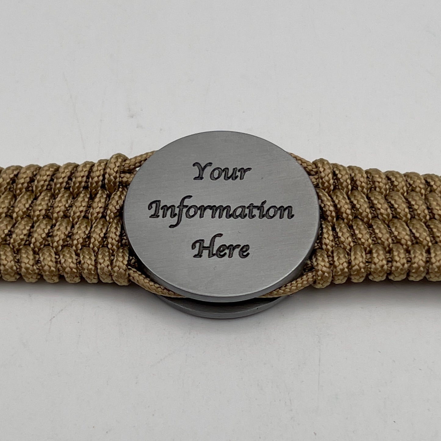 Thin, wide, flexible and comfortable braided United States Marine Corps Iwo Jima bracelet featuring an antique silver plated Iwo Jima flag raising medallion, a gold Cobra style tactical buckle and woven with gold Type-1 paracord.