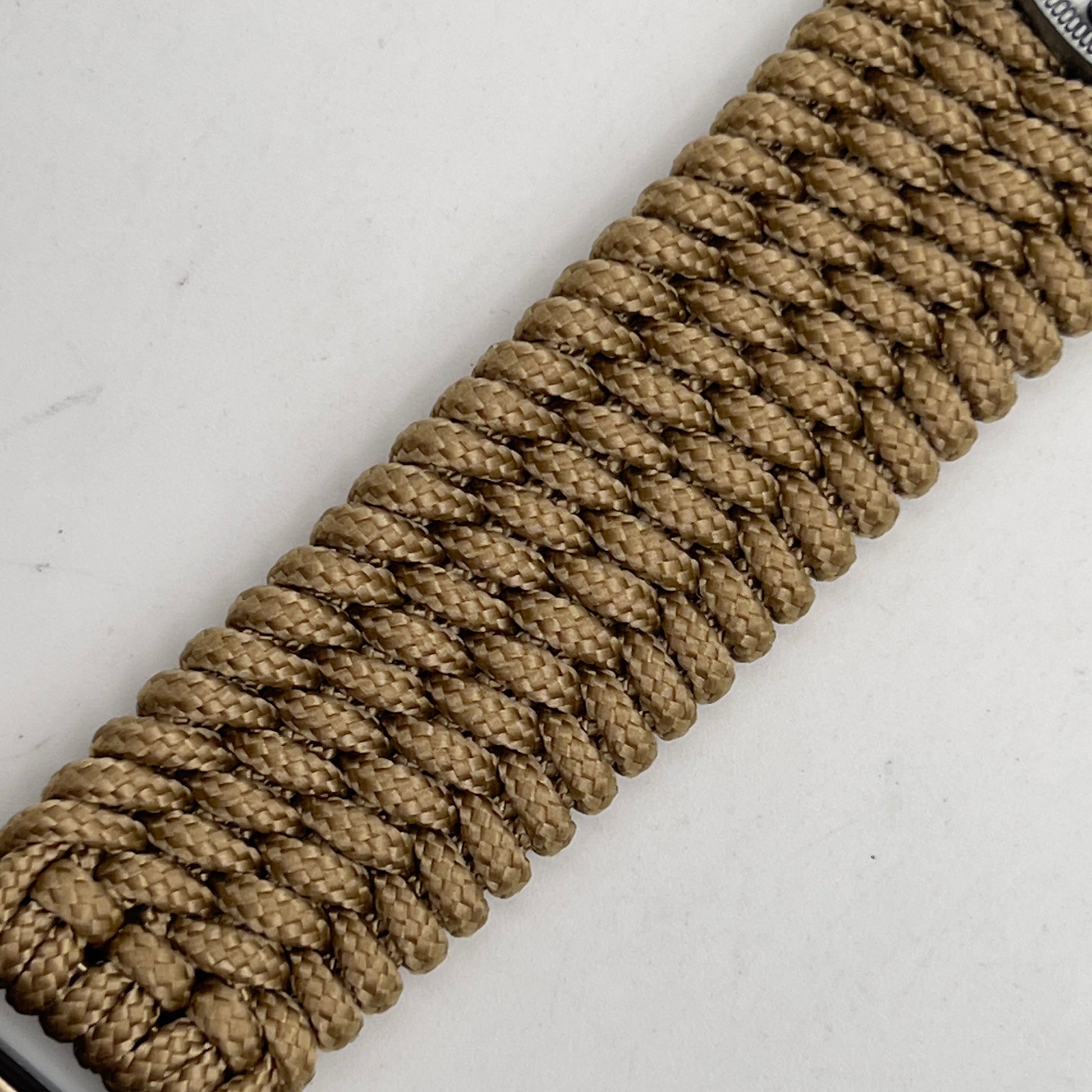 Thin, wide, flexible and comfortable braided United States Marine Corps Iwo Jima bracelet featuring an antique silver plated Iwo Jima flag raising medallion, a gold Cobra style tactical buckle and woven with gold Type-1 paracord.