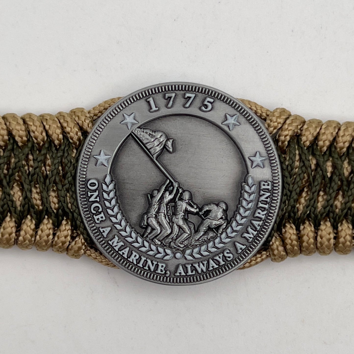 Thin, wide, flexible and comfortable braided United States Marine Corps Iwo Jima bracelet featuring an antique silver plated Iwo Jima flag raising medallion, a gold Cobra style tactical buckle and woven with gold Type-1 paracord and Olive Drab nano cord.