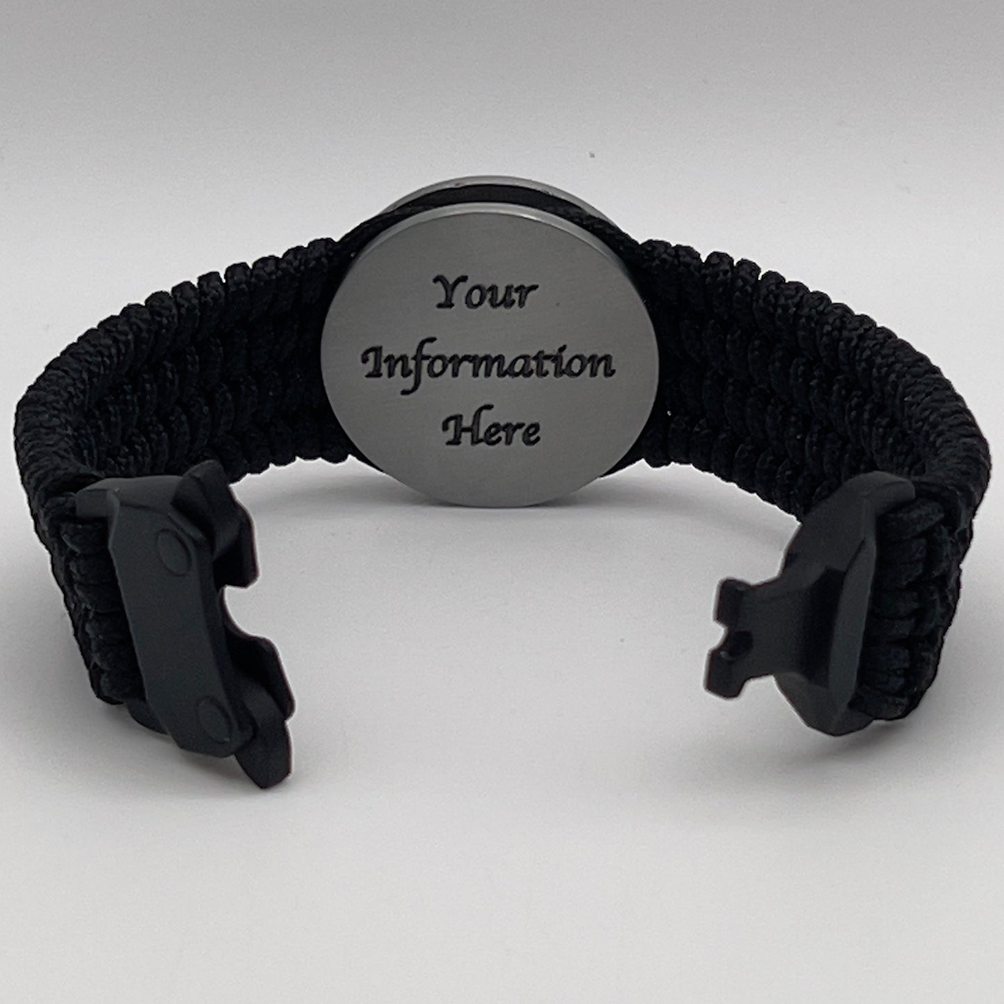 Thin, wide, flexible and comfortable braided United States Marine Corps Iwo Jima bracelet featuring an antique silver plated UV painted Iwo Jima flag raising medallion, a black Cobra style tactical buckle and woven with black Type-1 paracord.