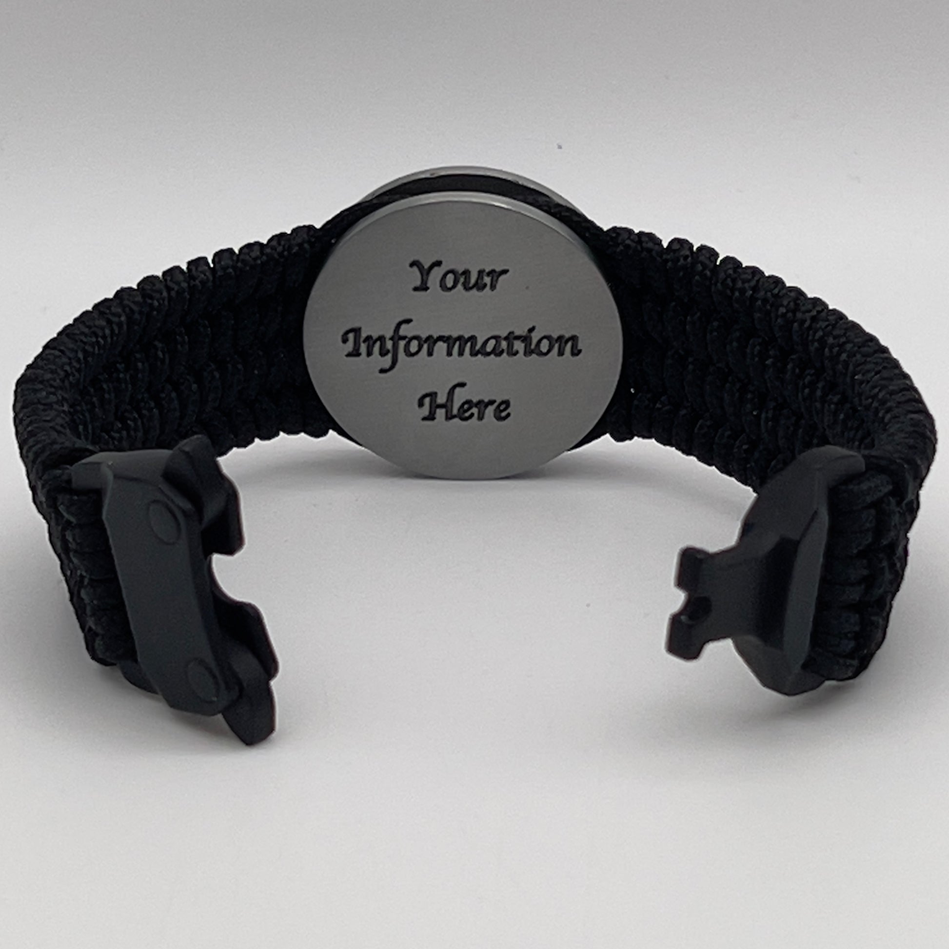 Thin, wide, flexible and comfortable braided United States Marine Corps Iwo Jima bracelet featuring an antique silver plated UV painted Iwo Jima flag raising medallion, a black Cobra style tactical buckle and woven with black Type-1 paracord.