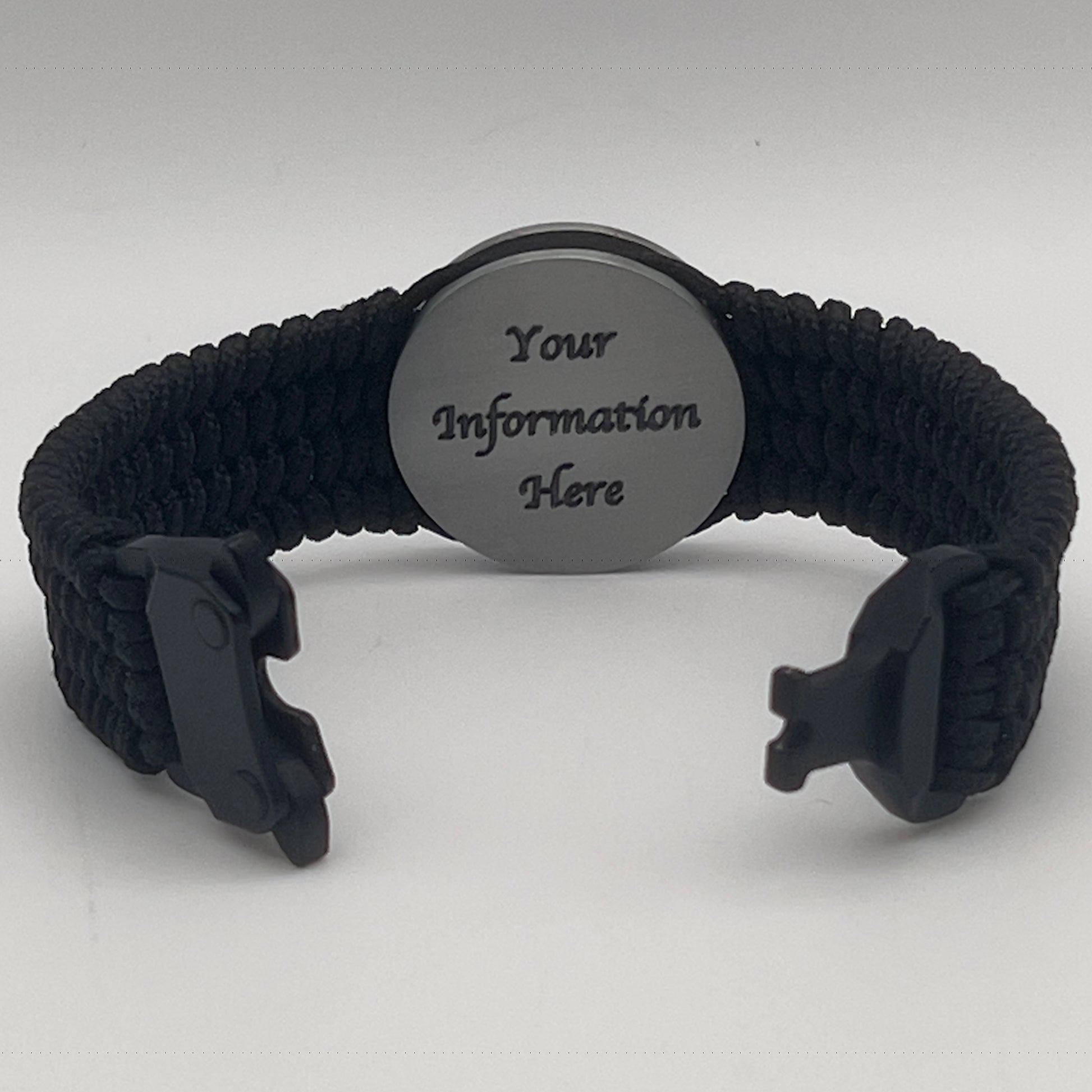 Thin, wide, flexible and comfortable braided United States Marine Corps Iwo Jima bracelet featuring an antique silver plated Iwo Jima flag raising medallion, a black Cobra style tactical buckle and woven with black Type-1 paracord.