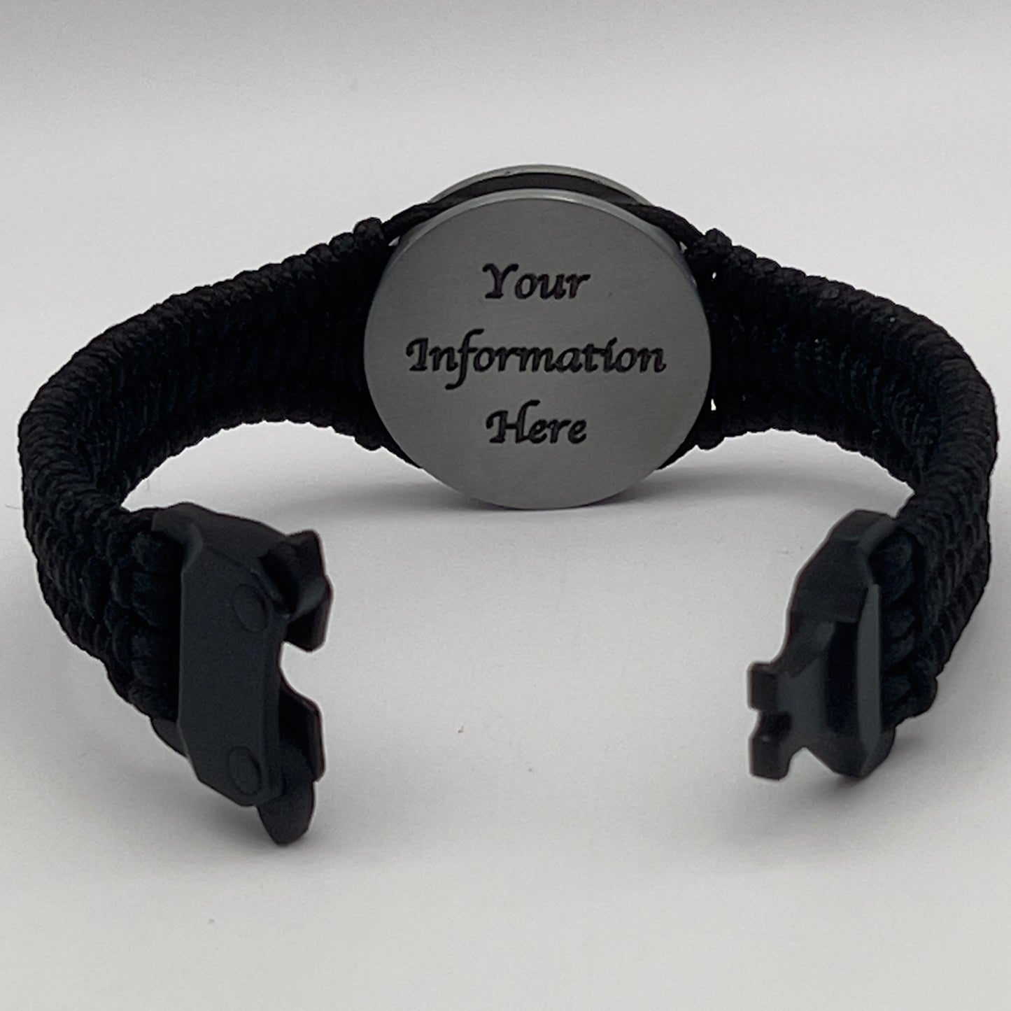 Thin, narrow and comfortable braided United States Marine Corps Iwo Jima bracelet featuring an antique silver plated UV painted Iwo Jima flag raising medallion, a black Cobra style tactical buckle and woven with black type-1 paracord.