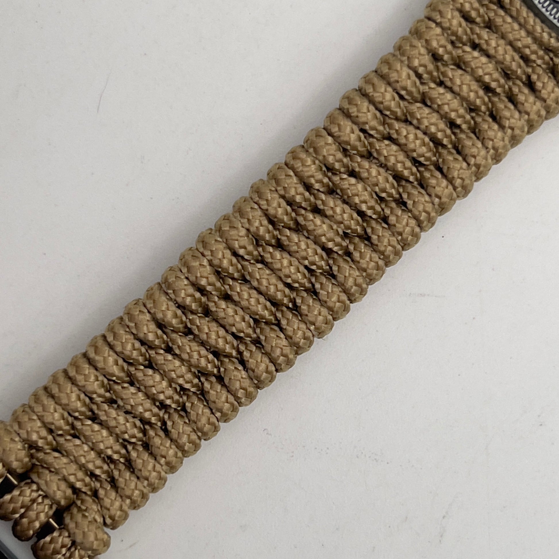 Thin, narrow, flexible and comfortable braided United States Marine Corps Iwo Jima bracelet featuring an antique silver plated Iwo Jima flag raising medallion, a gold Cobra style tactical buckle and woven with gold type-1 paracord.