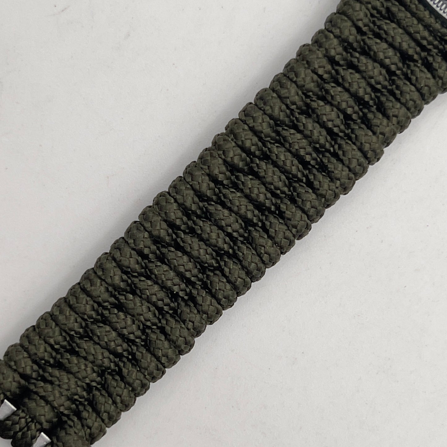 Thin, narrow, flexible and comfortable braided United States Marine Corps Iwo Jima bracelet featuring an antique silver plated UV painted Iwo Jima flag raising medallion, a silver Cobra style tactical buckle and woven with Olive Drab type-1 paracord.