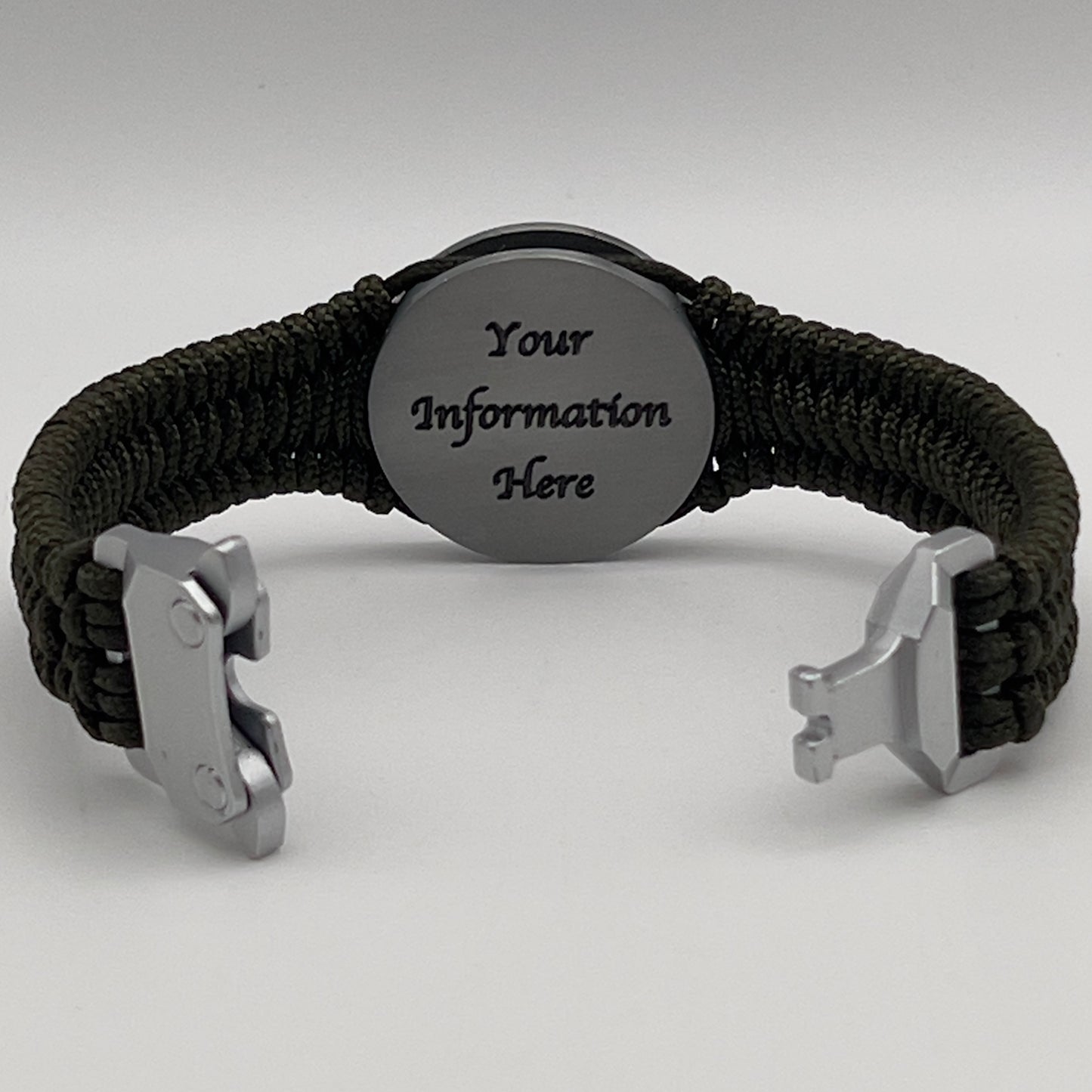 Thin, narrow, flexible and comfortable braided United States Marine Corps Iwo Jima bracelet featuring an antique silver plated UV painted Iwo Jima flag raising medallion, a silver Cobra style tactical buckle and woven with Olive Drab type-1 paracord.