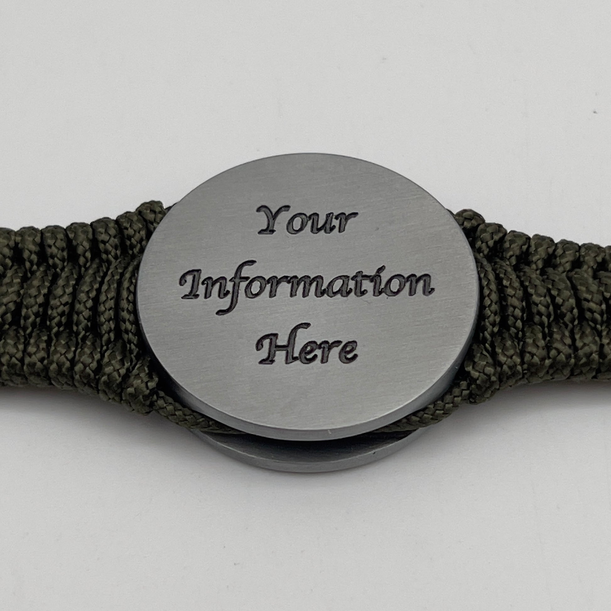 Thin, narrow, flexible and comfortable braided United States Marine Corps Iwo Jima bracelet featuring an antique silver plated UV painted Iwo Jima flag raising medallion, a silver Cobra style tactical buckle and woven with Olive Drab type-1 paracord.