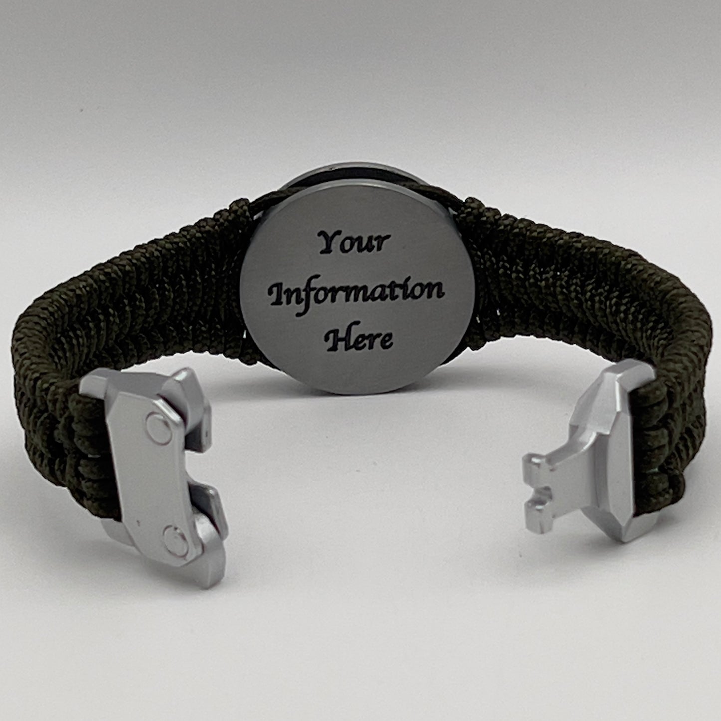 Thin, narrow, flexible and comfortable braided United States Marine Corps Iwo Jima bracelet featuring an antique silver plated UV painted Iwo Jima flag raising medallion, a silver Cobra style tactical buckle and woven with Olive Drab type-1 paracord.