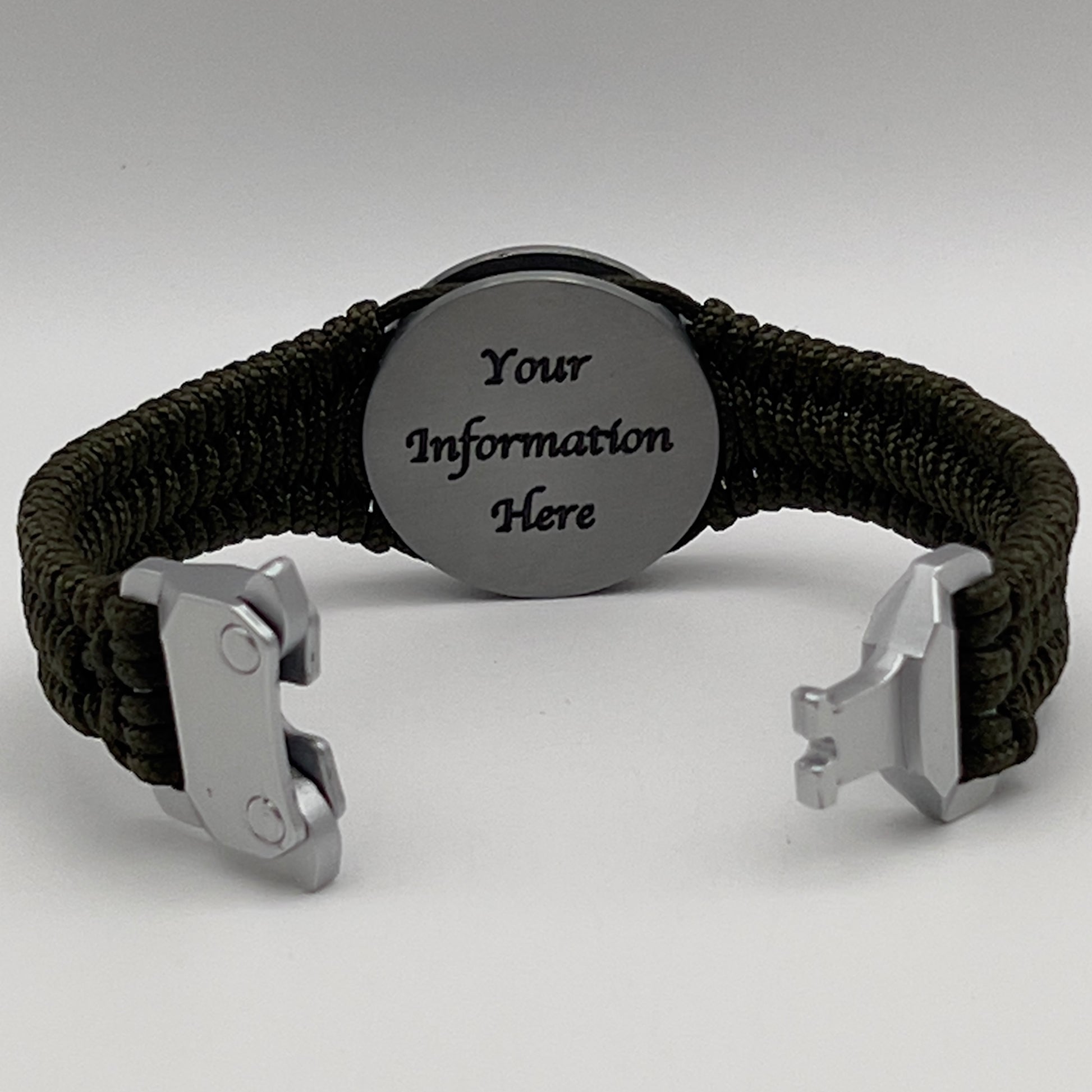 Thin, narrow, flexible and comfortable braided United States Marine Corps Iwo Jima bracelet featuring an antique silver plated UV painted Iwo Jima flag raising medallion, a silver Cobra style tactical buckle and woven with Olive Drab type-1 paracord.