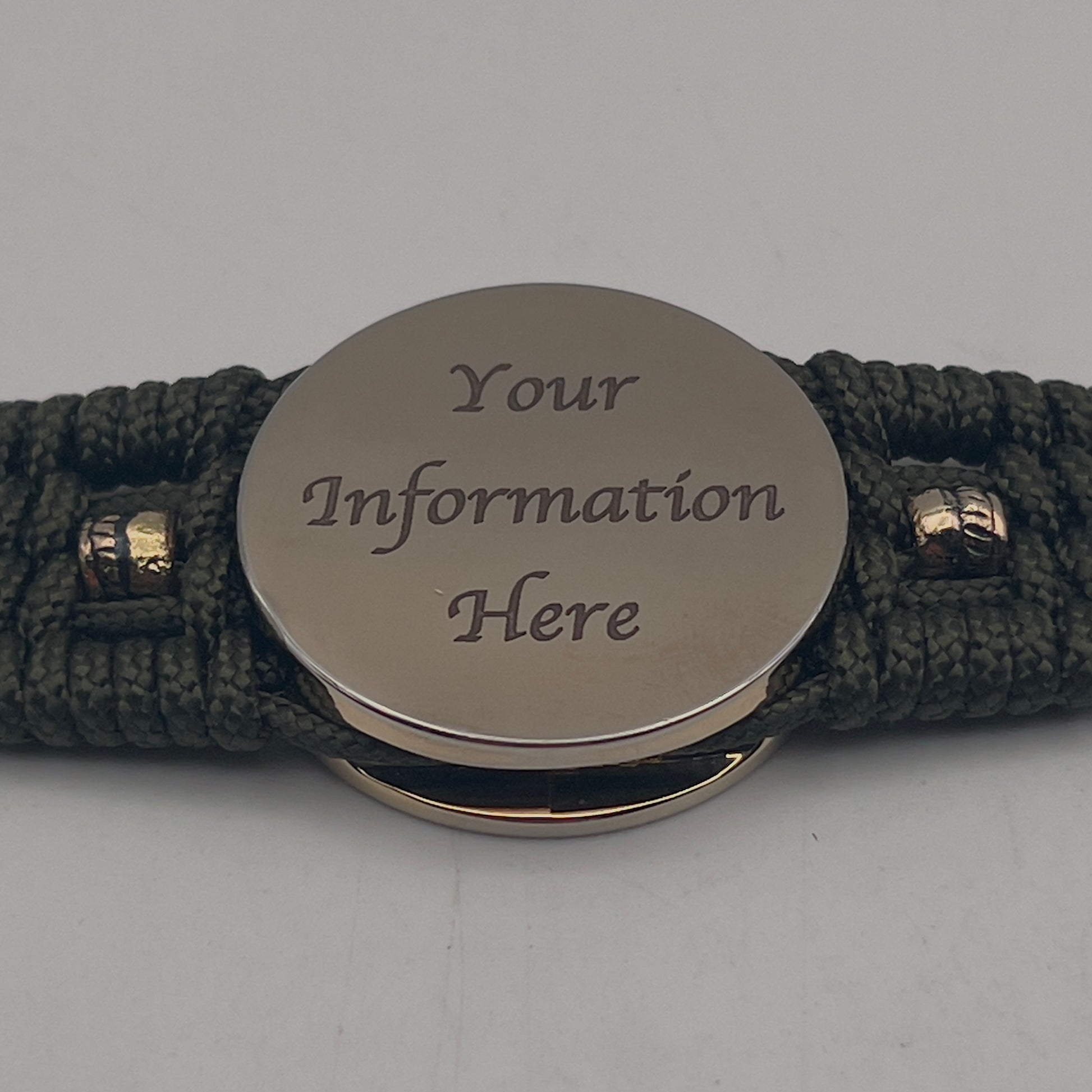 Thin, medium width, flexible and comfortable braided United States Marine Corps bracelet featuring a 24K gold plated USMC officer Eagle Globe and Anchor medallion, six Spartan micro beads, a gold Cobra style tactical buckle and woven with Olive Drab Type-1 paracord.