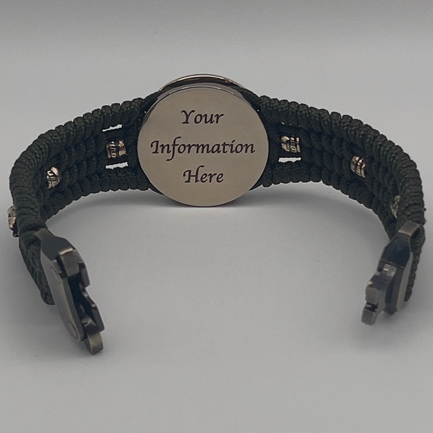 Thin, medium width, flexible and comfortable braided United States Marine Corps bracelet featuring a 24K gold plated USMC officer Eagle Globe and Anchor medallion, six Spartan micro beads, a gold Cobra style tactical buckle and woven with Olive Drab Type-1 paracord.