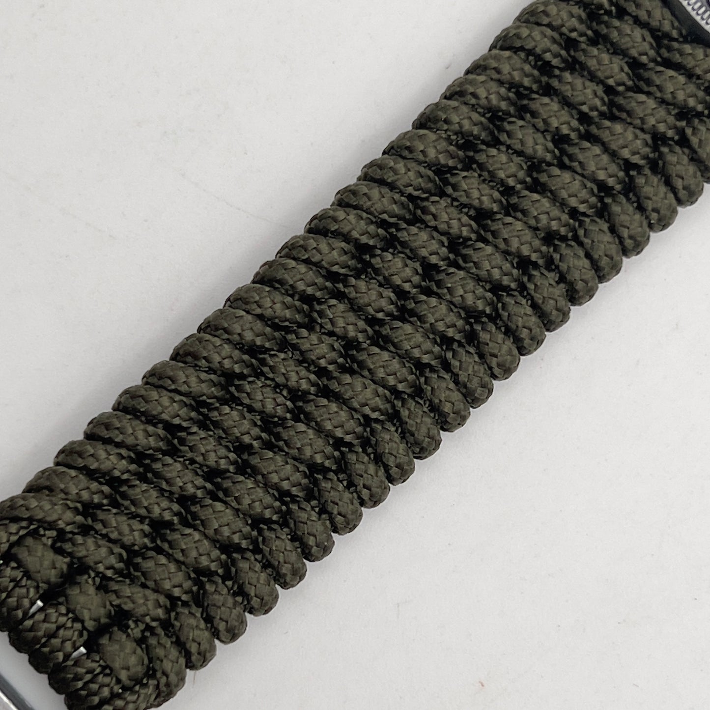 Thin, wide, flexible and comfortable braided United States Marine Corps Iwo Jima bracelet featuring an antique silver plated Iwo Jima flag raising medallion, a silver Cobra style tactical buckle and woven with olive drab type-1 paracord.