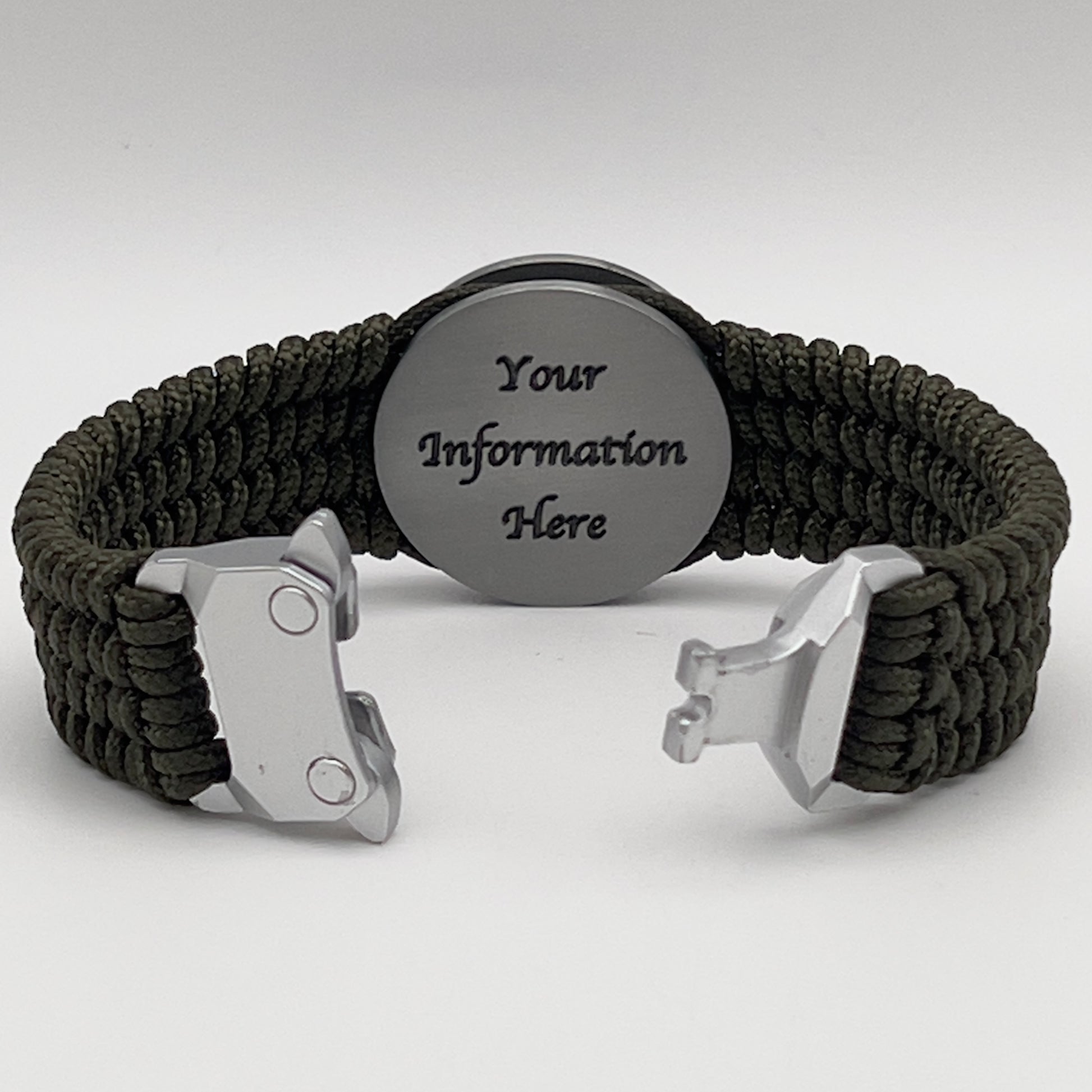 Thin, wide, flexible and comfortable braided United States Marine Corps Iwo Jima bracelet featuring an antique silver plated Iwo Jima flag raising medallion, a silver Cobra style tactical buckle and woven with olive drab type-1 paracord.