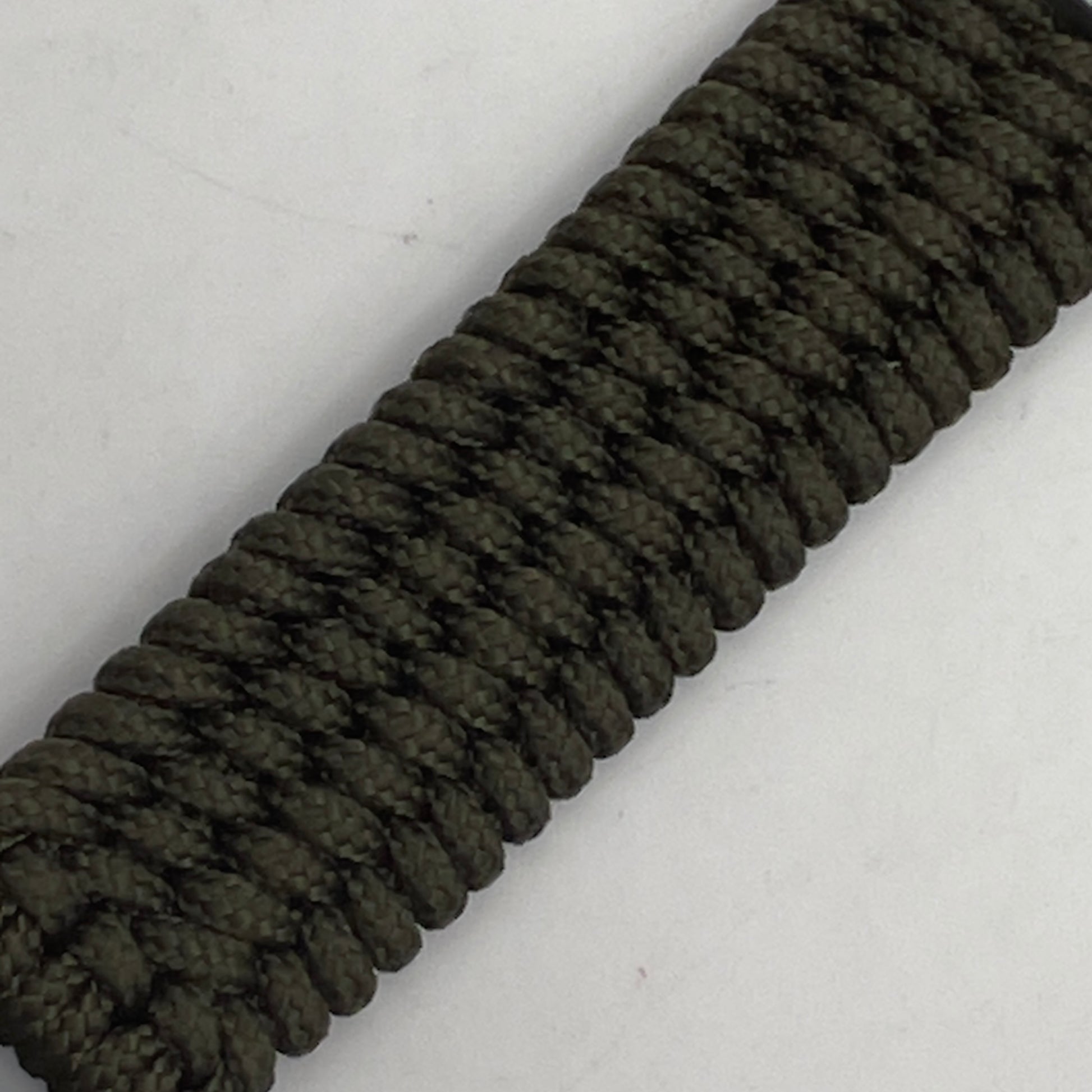 Thin, wide, flexible and comfortable braided United States Marine Corps Iwo Jima bracelet featuring an antique silver plated UV painted Iwo Jima flag raising medallion, a silver Cobra style tactical buckle and woven with olive drab Type-1 paracord.