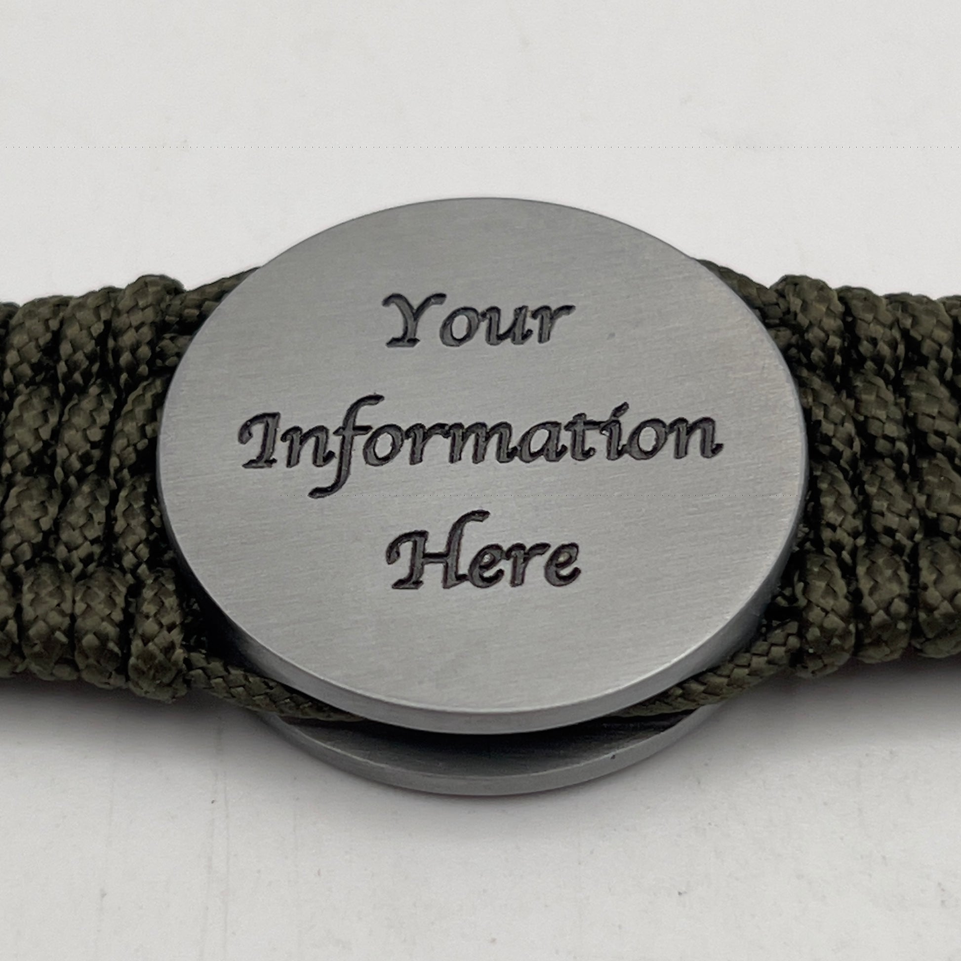 Thin, wide, flexible and comfortable braided United States Marine Corps Iwo Jima bracelet featuring an antique silver plated UV painted Iwo Jima flag raising medallion, a silver Cobra style tactical buckle and woven with olive drab Type-1 paracord.